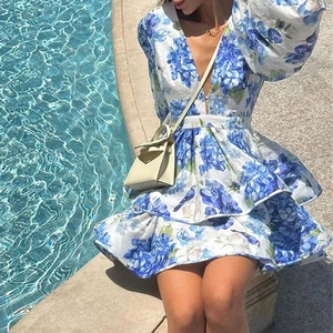 Floral V-neck tiered maxi dress with lantern sleeves and blue hydrangea bird print pattern