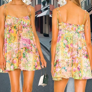 Women floral print spaghetti strap summer dress with backless design and ruffles