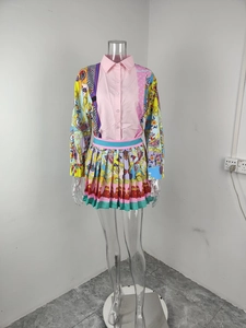 Detail of vintage baroque print long sleeve shirt and matching pleated skirt set