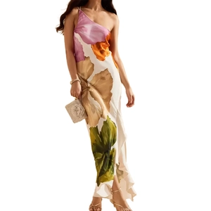 Floral one shoulder maxi dress with ruffle hem and vibrant tropical flower print