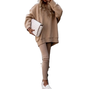 Women's khaki lounge set with oversized crewneck sweatshirt and matching slim leggings