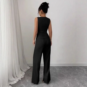 Rear view of women's black sleeveless vest and high-waist wide-leg trousers set