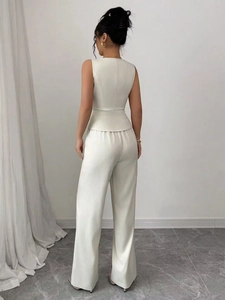 Women's chic white sleeveless peplum top and high-waisted wide-leg trouser set