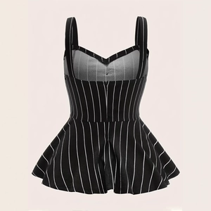 Detail of black and white vertical striped peplum top featuring a ruffled hem and a slim fit