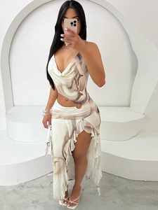 Sexy halter neck dress with marble print, waist cutout ring, and ruffled asymmetric slit