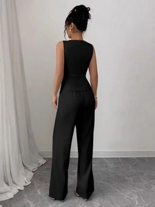 Women's two-piece set featuring a black sleeveless tailored vest and high-waist wide-leg pants