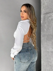 Elegant white satin long sleeve open back shirt with decorative metal chain detail