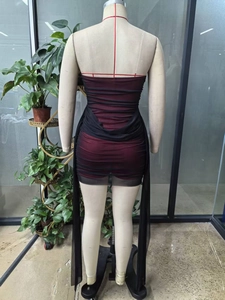 Detail view of red and black gradient mesh fabric on elegant bodycon evening dress