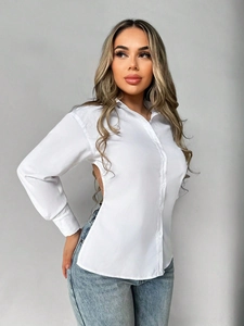 Elegant white long sleeve button-up shirt featuring a stylish backless cutout design
