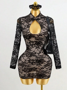 Elegant black lace mini dress with teardrop cutout and mandarin collar on mannequin