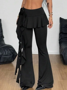 Women's black flared layered skirt leggings featuring elegant cascading ruffles design
