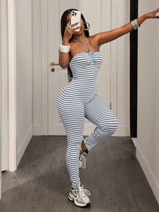 Slim fit women's halter jumpsuit with blue and white stripes in a bodycon style