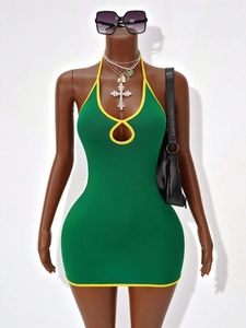 Sexy halter neck bodycon dress in green with yellow trim and cutout detail