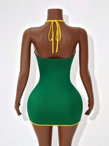 Sexy green halter neck bodycon mini dress with yellow trim and open back design
