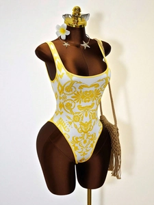 Baroque floral print one-piece swimsuit in yellow and white with high-cut design