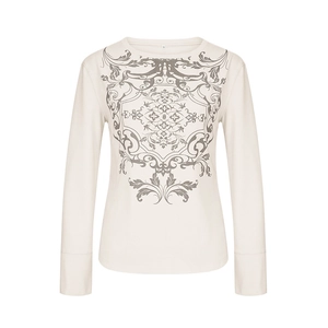 Detail of waffle knit fabric and baroque vine print on off-white long sleeve tee