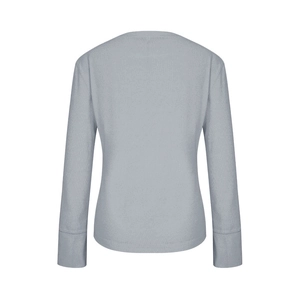 Rear view of light blue waffle knit top showing soft ribbed texture and wide cuffs