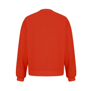 Detail view of the red crewneck sweatshirt back showing ribbed hem and cotton texture
