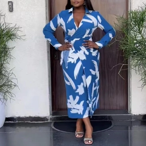 Women's royal blue v-neck wrap dress with white abstract brush print and waist tie