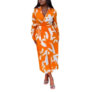 Elegant orange wrap maxi dress with white abstract print and waist tie closure