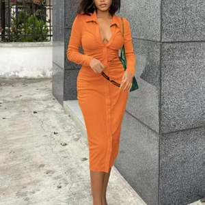 Elegant orange ribbed knit midi dress with V-neckline and ruched front button detail