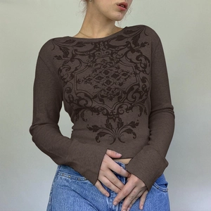 Detail view of brown waffle knit long sleeve tee with baroque floral print for women