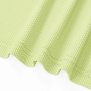 Macro detail of mint green ribbed knit fabric featuring high-quality double-needle stitching