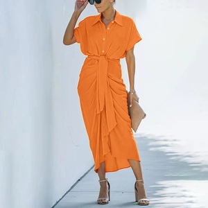 Vibrant orange short sleeve polo collar shirt dress with waist tie and pleated skirt