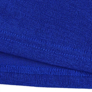 Detail shot of royal blue knit dress featuring precise double-needle stitching and texture