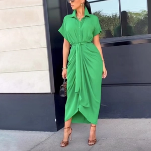 Vibrant green polo collar short sleeve midi dress with waist tie and pleated skirt detail