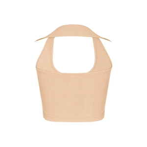 Detail der apricotfarbenen Rippstrick-Stoffstruktur am sexy Neckholder Crop Top