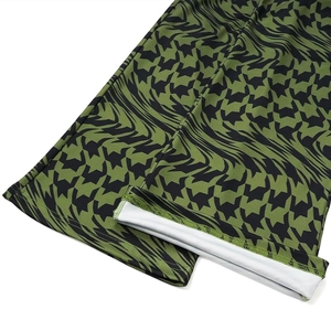 Detail of printed wide leg trousers showing high-quality stitching and white inner lining