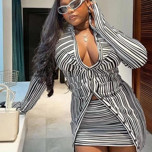 Chic black and white striped two-piece set with V-neck button shirt and mini skirt
