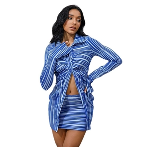 Women's blue striped two-piece set featuring long sleeve crop shirt and mini bodycon skirt