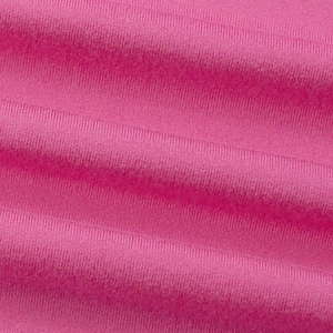 Detailed macro shot of hot pink ribbed knit fabric showing soft texture and vertical patterns
