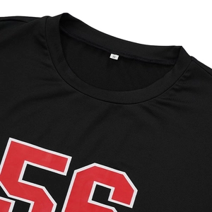 Detail of black crew neck T-shirt with red number 56 print and S size label inside collar