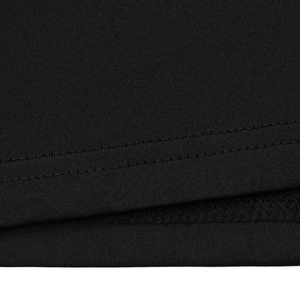 Close-up of black cotton knit fabric with durable double-needle stitching and hem details