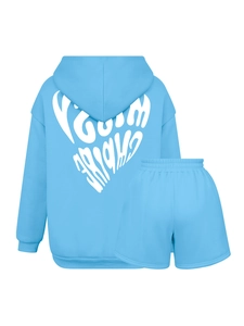 Detail of bright blue hoodie back featuring white heart-shaped Youth Dreams graphic print
