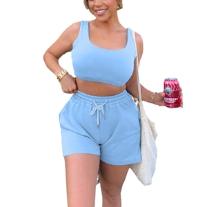Women's two-piece casual set featuring a light blue U-neck crop top and drawstring shorts