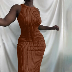 Detail shot of deep brown cable knit sleeveless bodycon dress with textured finish