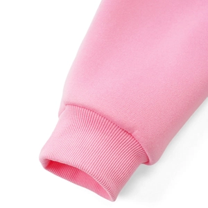 Close-up of pink long sleeve hoodie set showing detailed ribbed cuffs and soft fabric texture