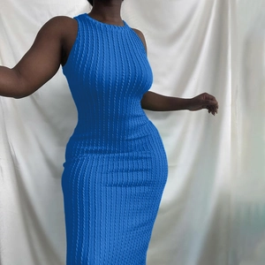 Detailed ribbed texture of a slim fit sleeveless knitted maxi dress in Klein blue