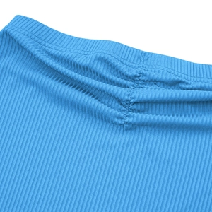 Close-up of sky blue ribbed knit fabric with pleated details and waistline stitching
