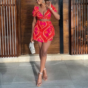 Women's V-neck crop top and wrap mini skirt two-piece set with vibrant bohemian print