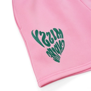 Detail of pink cotton shorts with green heart MISSY EMPIRE print and stitching