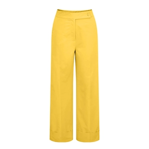 Detail of high-waist yellow wide-leg trousers with single button and cuffed hems