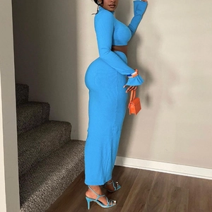 Women's two-piece blue knit set featuring a cropped long sleeve top and a slim maxi skirt