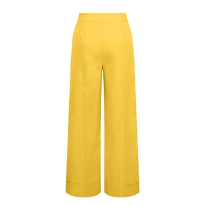 Detailed view of high waisted ginger yellow wide leg trousers with stylish cuffed hem