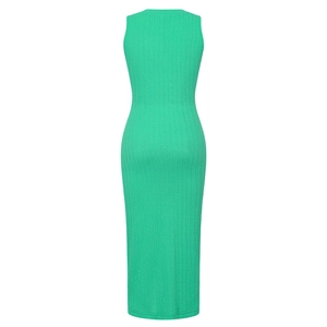 Rear view of emerald green knit midi dress showing cable stitch texture and slim fit