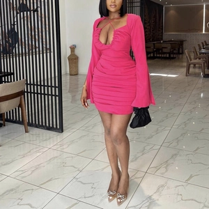 Sexy hot pink ruched mini dress with deep V-neck, lace-up detail, and flared sleeves
